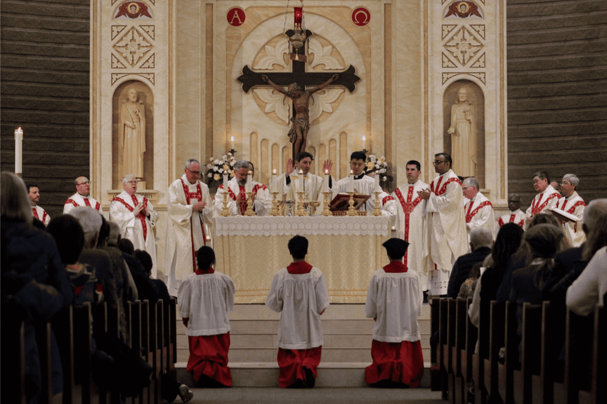 Cardinal Leo and priests celebrating Mass at St. Isaac Jogues Parish